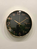 Modern wall clock for living room décor
Wall clock with black face and gold casing on a white wall