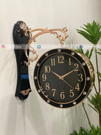 Decorative wall clock Modern wall clock for living room décor with black face and gold accents on a white background