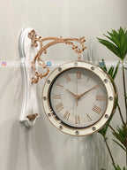 Decorative Modern wall clock for living room décor with gold and white design on a light background