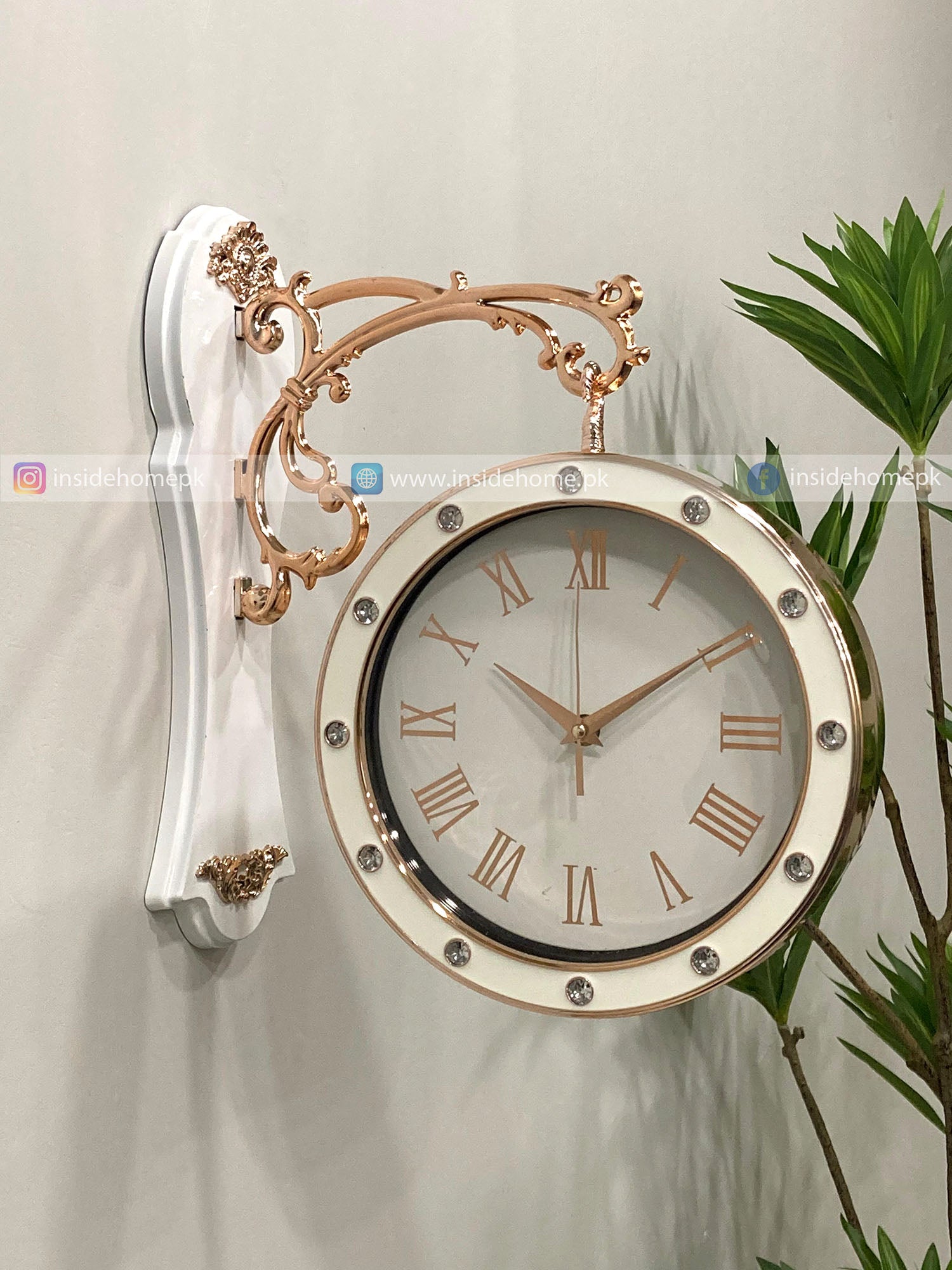 Decorative Modern wall clock for living room décor with gold and white design on a light background